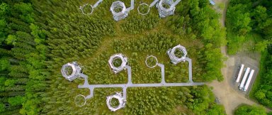 Yurt-like test chambers in a natural boreal spruce bog in northern Minnesota (provided).